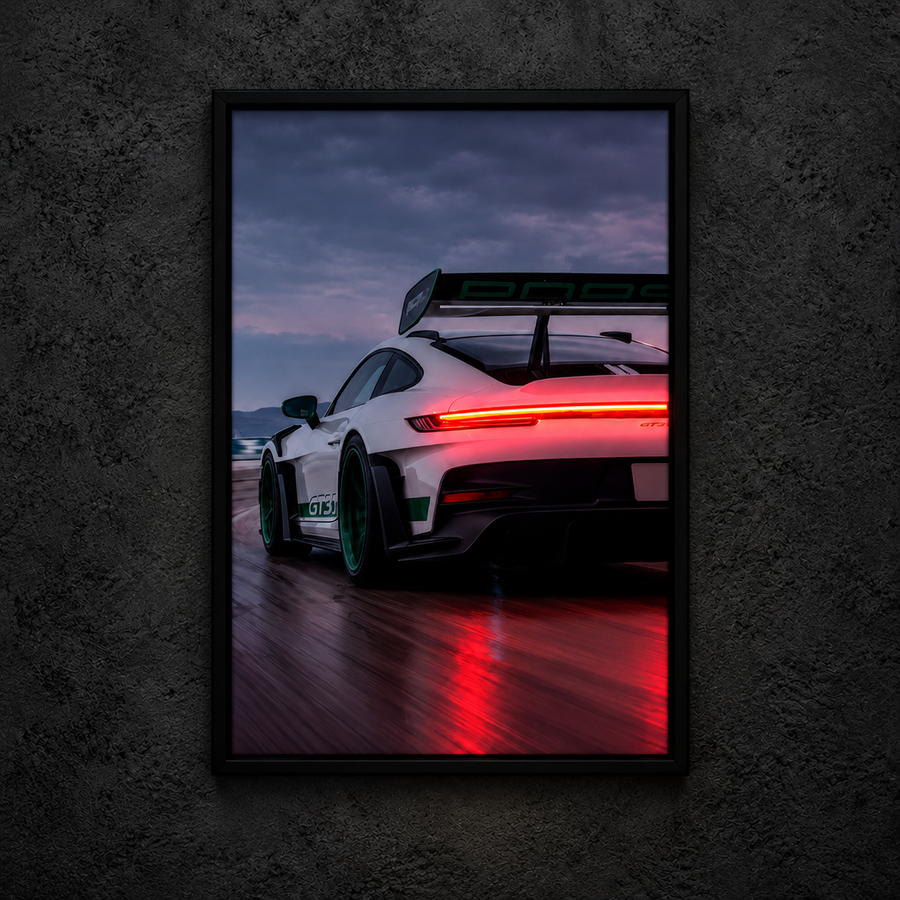 Porsche artwork showing the rear of a white sports car on a wet road, with red neon rear light lit.