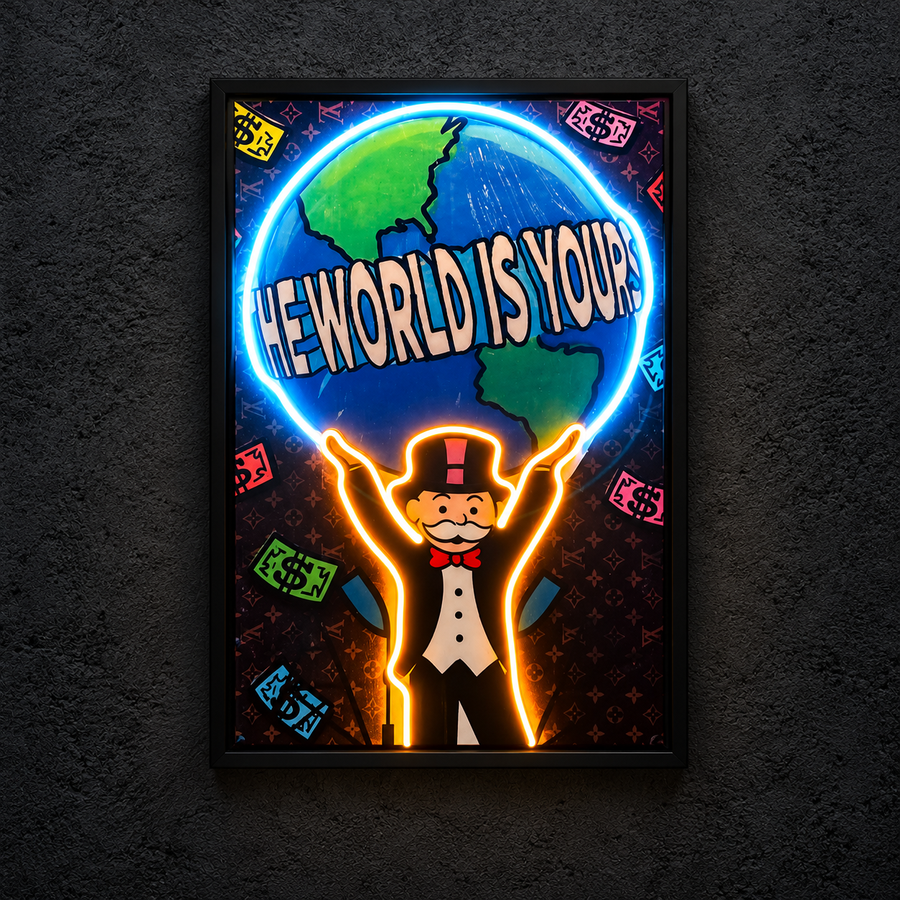 Framed The World Is Yours artwork showing a top-hatted character holding a globe with The World Is Yours lettering, with a blue globe and orange figure outline illuminated.